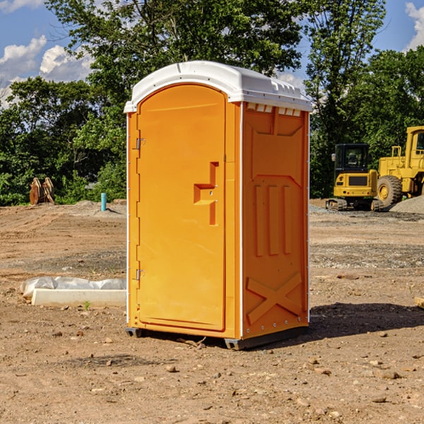 what is the cost difference between standard and deluxe portable restroom rentals in Norene